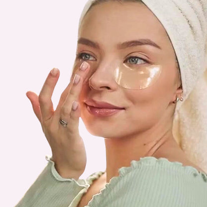 Person using Golden Glow Collagen Eye Masks